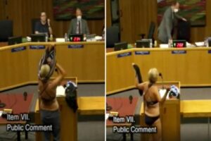 Woman disrobes at California school board meeting in protest of locker room policies