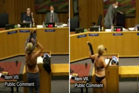 Woman disrobes at California school board meeting in protest of locker room policies