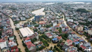 Record flooding hits Vietnam city, eight killed in north