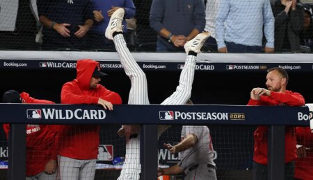Yankees’ Ryan McMahon flips over railing to preserve rookie Cam Schlittler’s historic gem, knock out Red Sox