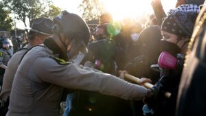 DHS: ICE agents ‘boxed in by 10 cars’ near Chicago as protests grow; 5 more arrests made