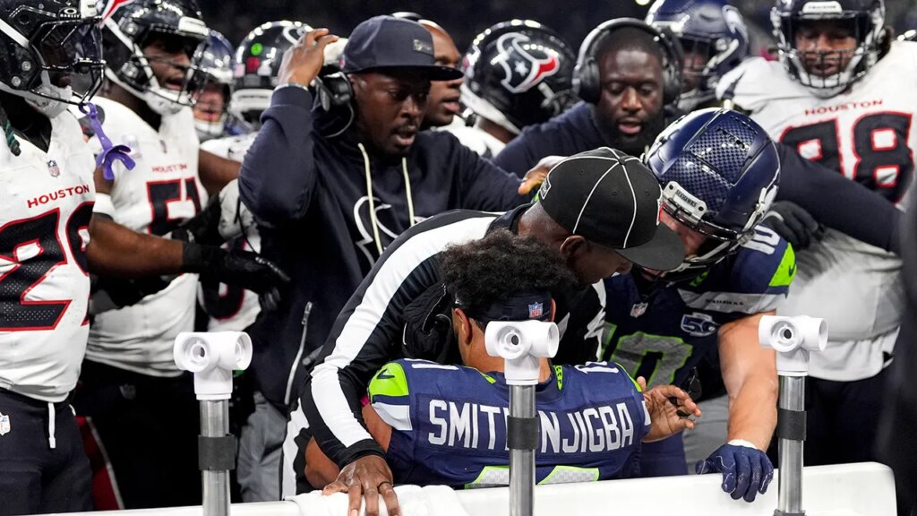 NFL official goes viral after stepping in to protect Seahawks’ Jaxon Smith-Njigba during sideline scuffle