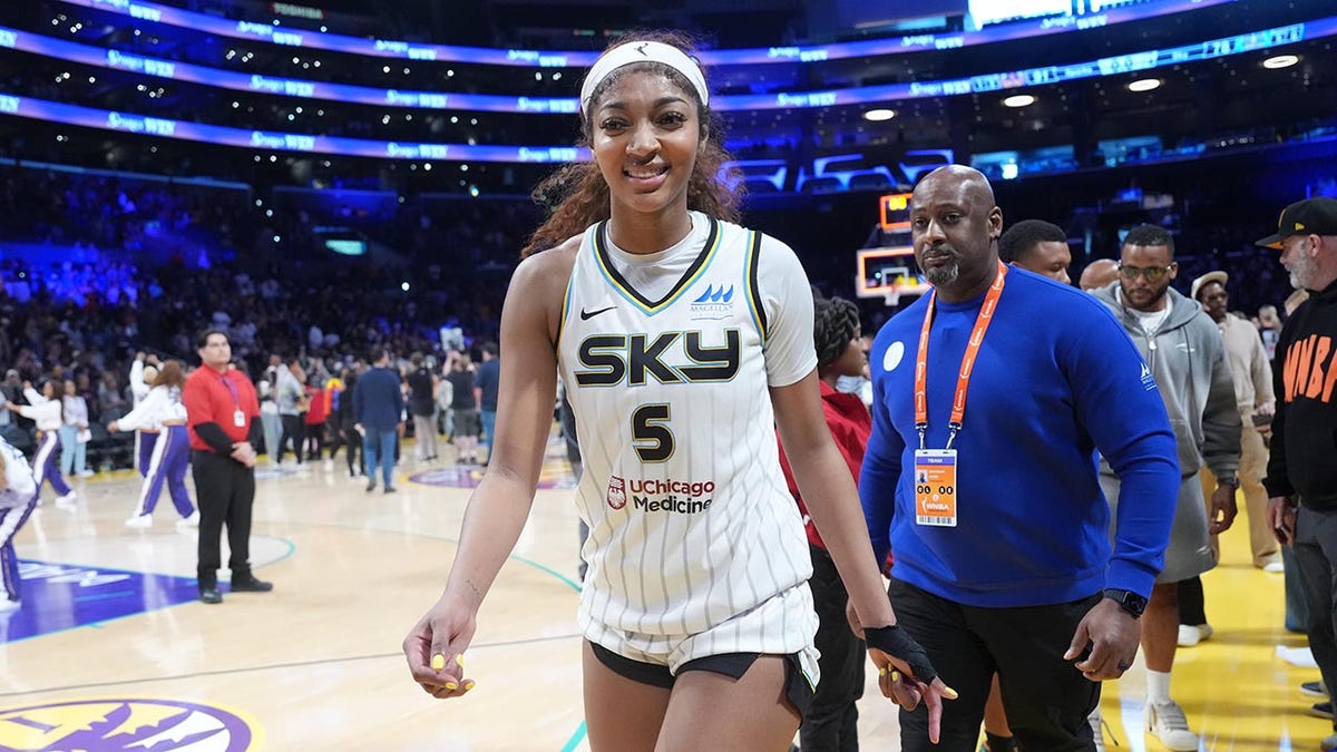 Angel Reese walks off the court