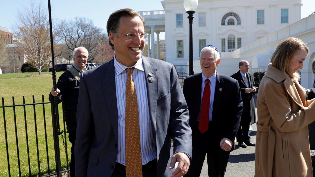 dave brat walks at white house