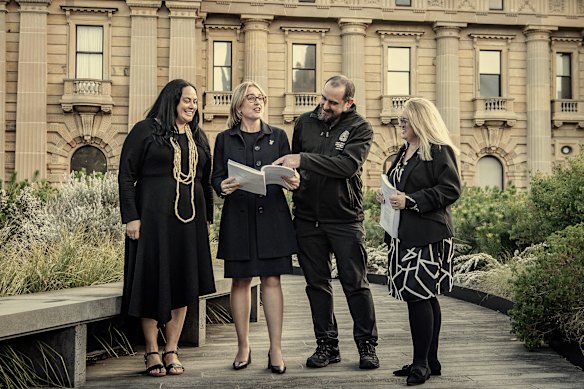 Victorian Premier Jacinta Allan, second left, holds treaty legislation with First Peoples’ Assembly members including co-chairs Ngarra Murray, left, and Rueben Berg in September. 
