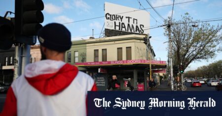 Pro-Hamas message painted over Fitzroy billboard on anniversary of October 7 attacks