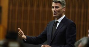 Housing minister mum on development fee cuts despite Liberal campaign vow