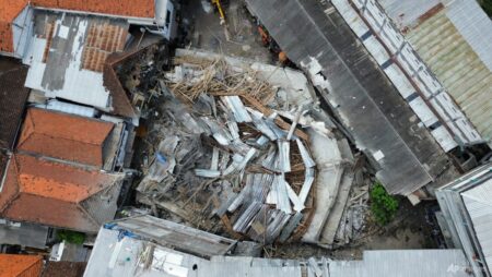 59 people still trapped under collapsed Indonesian school