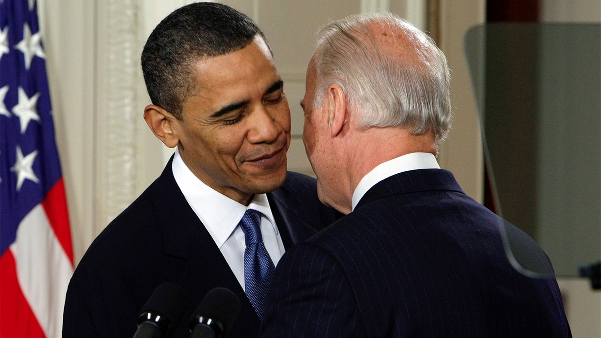 Then-Vice President Joe Biden whispers "This is a big f------ deal," to President Barack Obama after introducing Obama during the health care bill ceremony