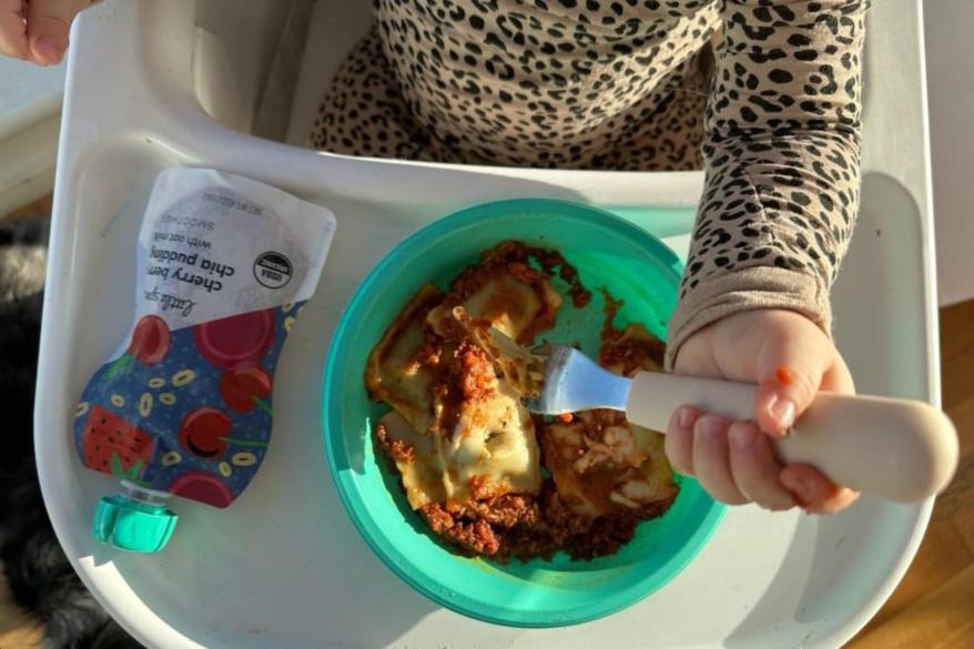 A child eating dinner