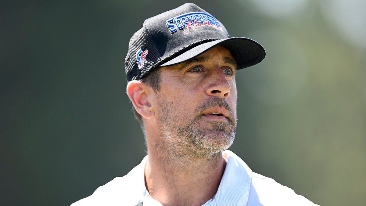 Aaron Rodgers participates in a golf tournament