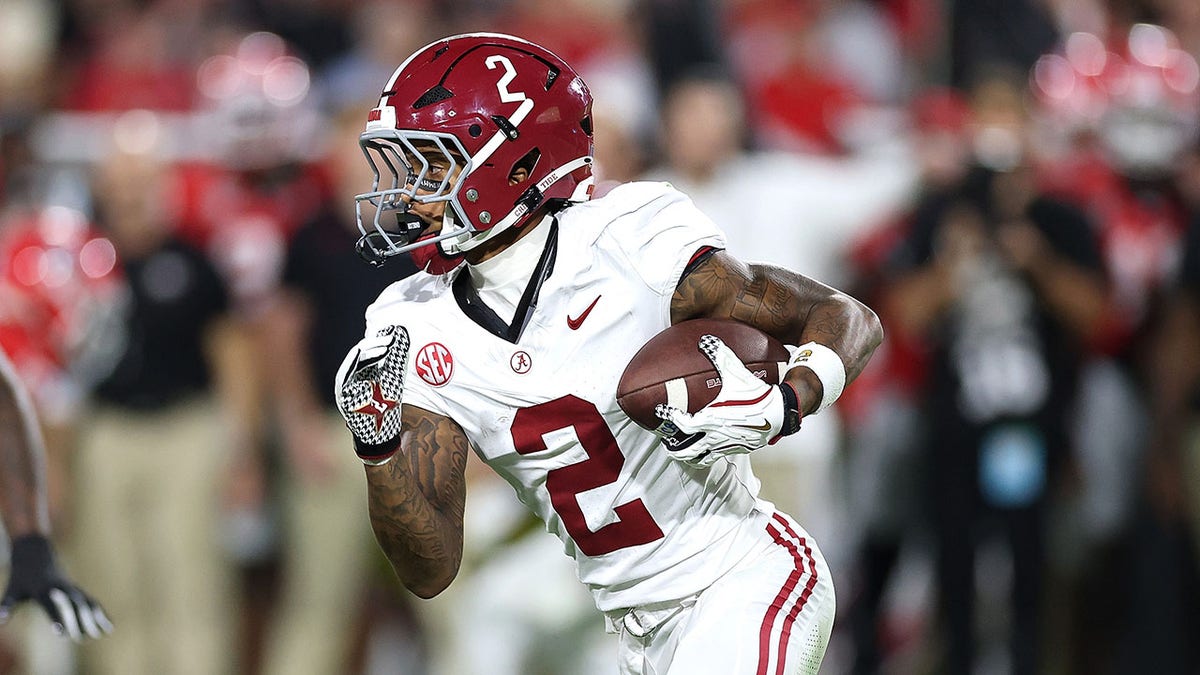 Ryan Williams runs with ball