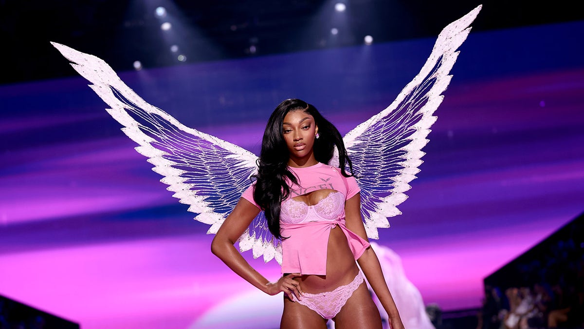 Angel Reese walks the runway