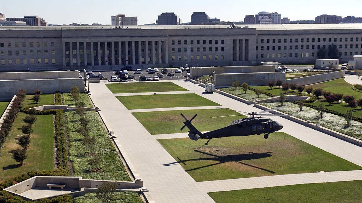 An Army Black Hawk helicopter lands at the Pentagon.