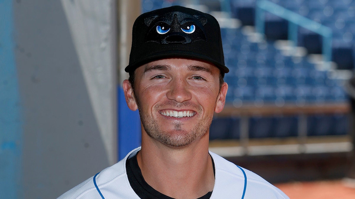 Blake Butera looks on