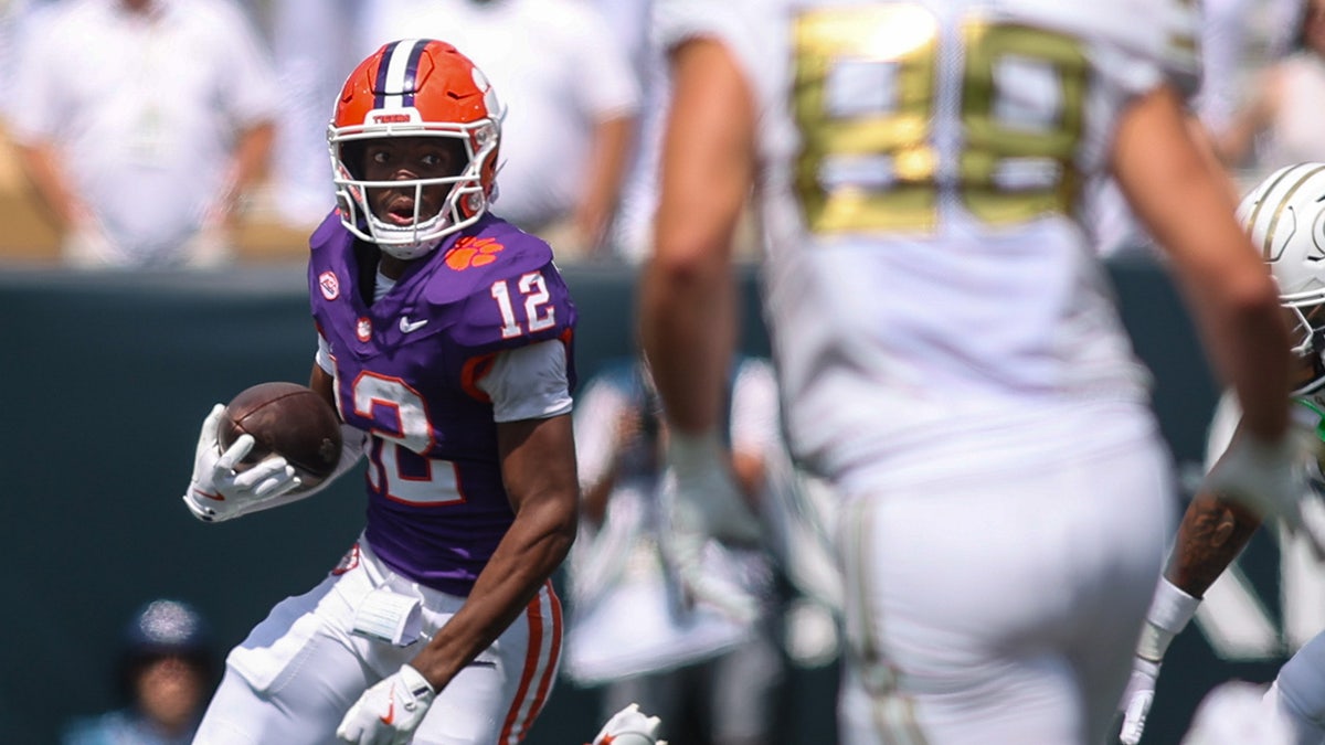 Bryant Wesco Jr. returns a punt.