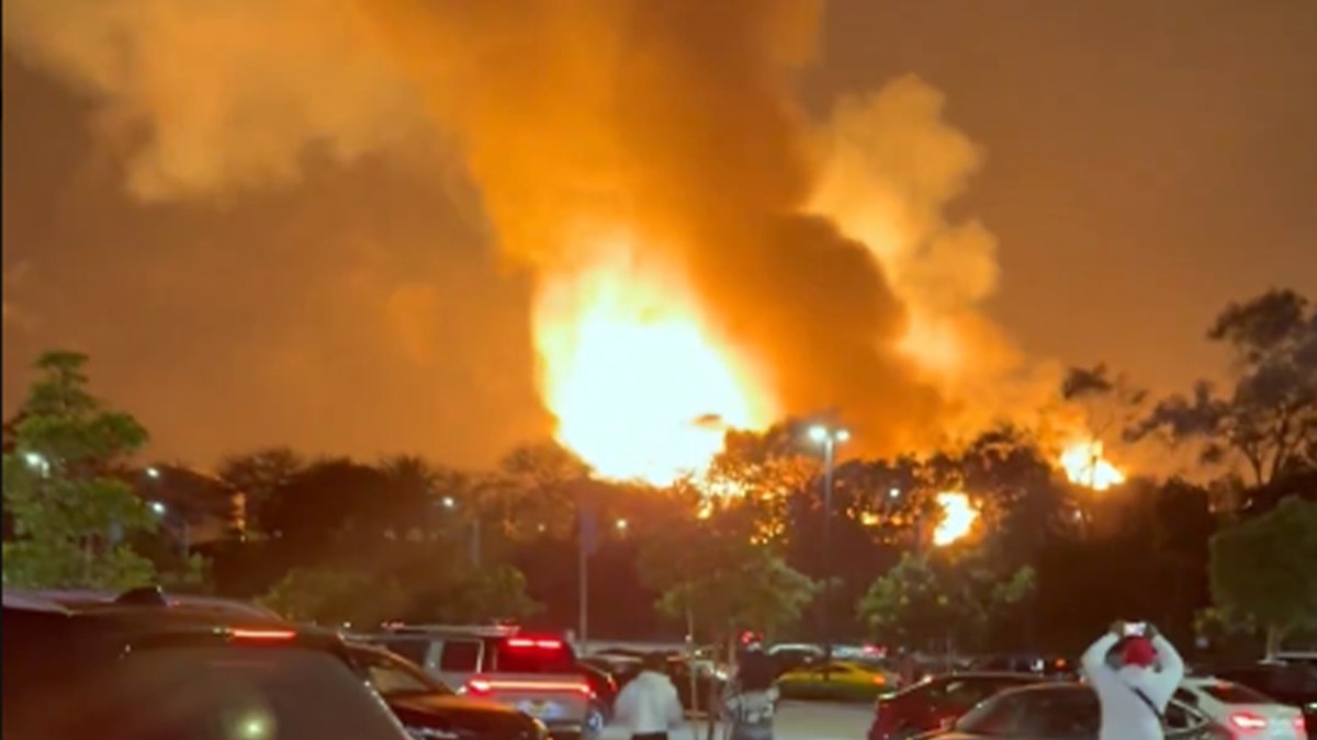 Flames from Chevron refinery fire ignite California sky