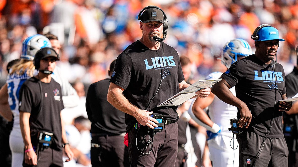Dan Campbell looks on