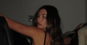 Hailey Bieber Flashes Major Skin in Black Lingerie and Bra While Posing for Cheeky Rhode Photos