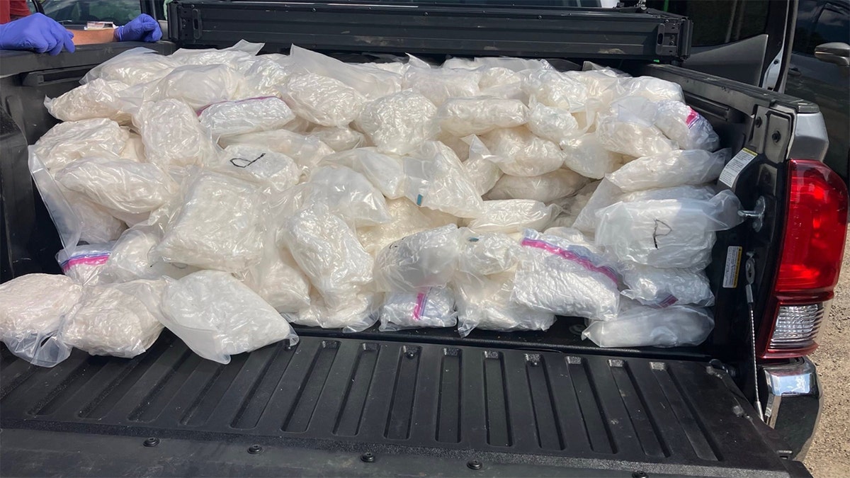 Two men were arrested on Monday after law enforcement seized nearly 900 pounds of suspected methamphetamine worth approximately $1.7 million.