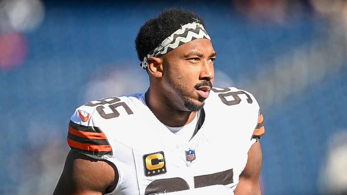 Myles Garrett peers onto field