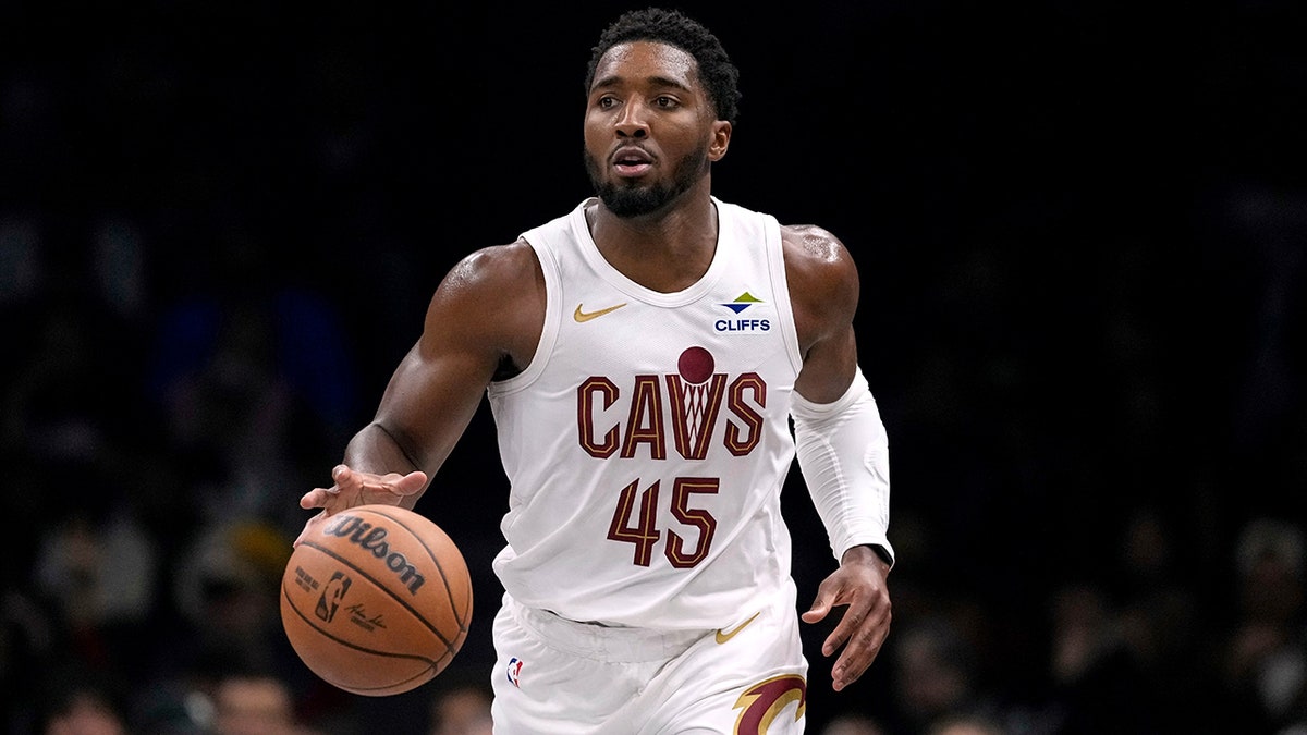 Donovan Mitchell looks to pass