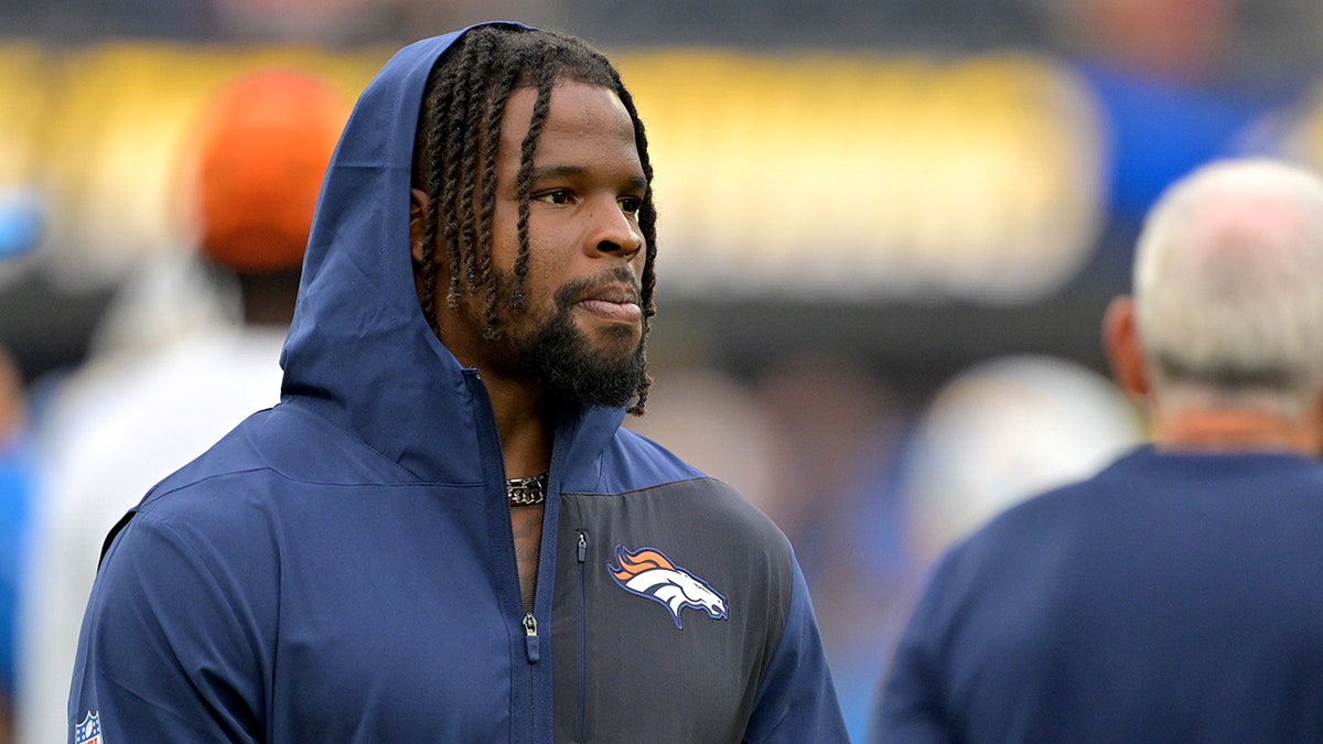 Dre Greenlaw on the sidelines