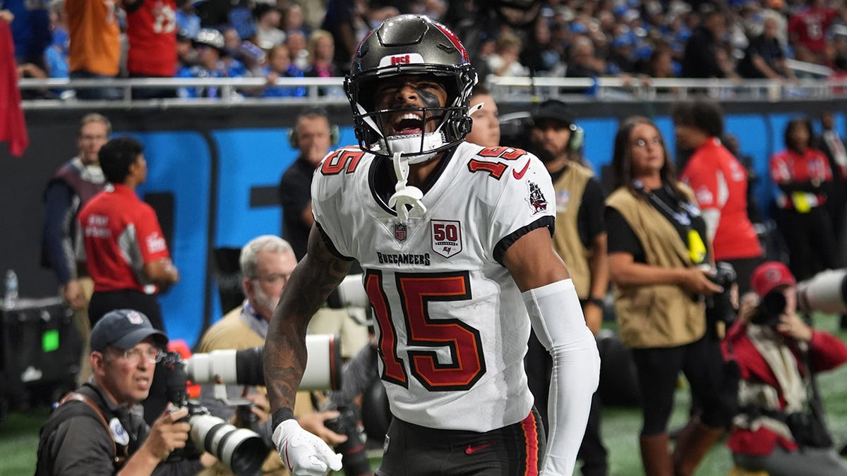 Tez Johnson celebrates a touchdown