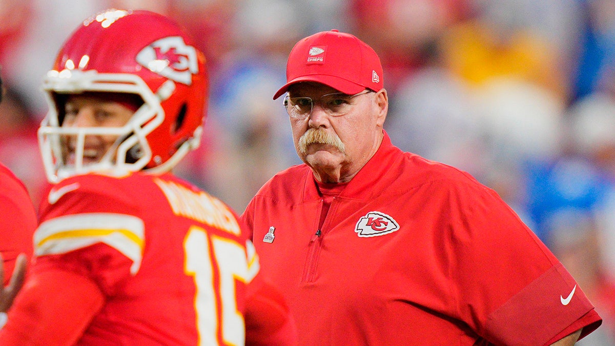 Andy Reid looks on