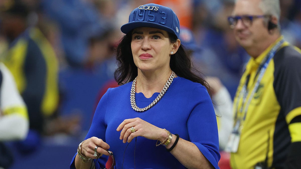 Carlie Irsay-Gordon smiles on the sideline