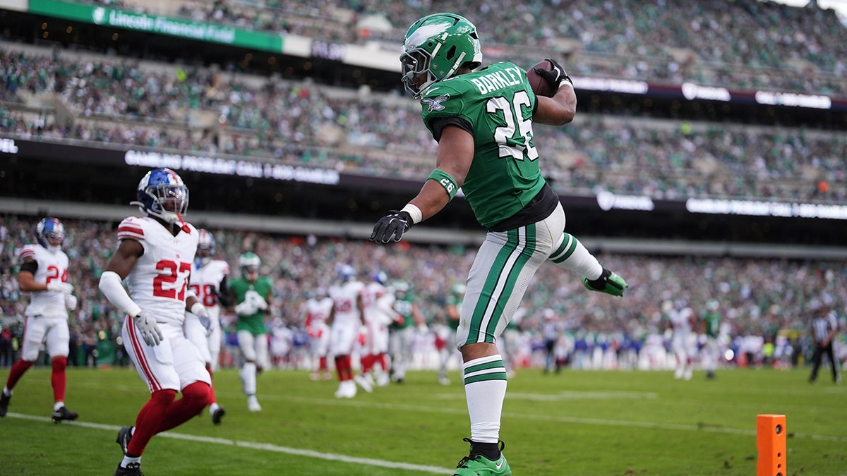 Saquon Barkley jumps into the end zone