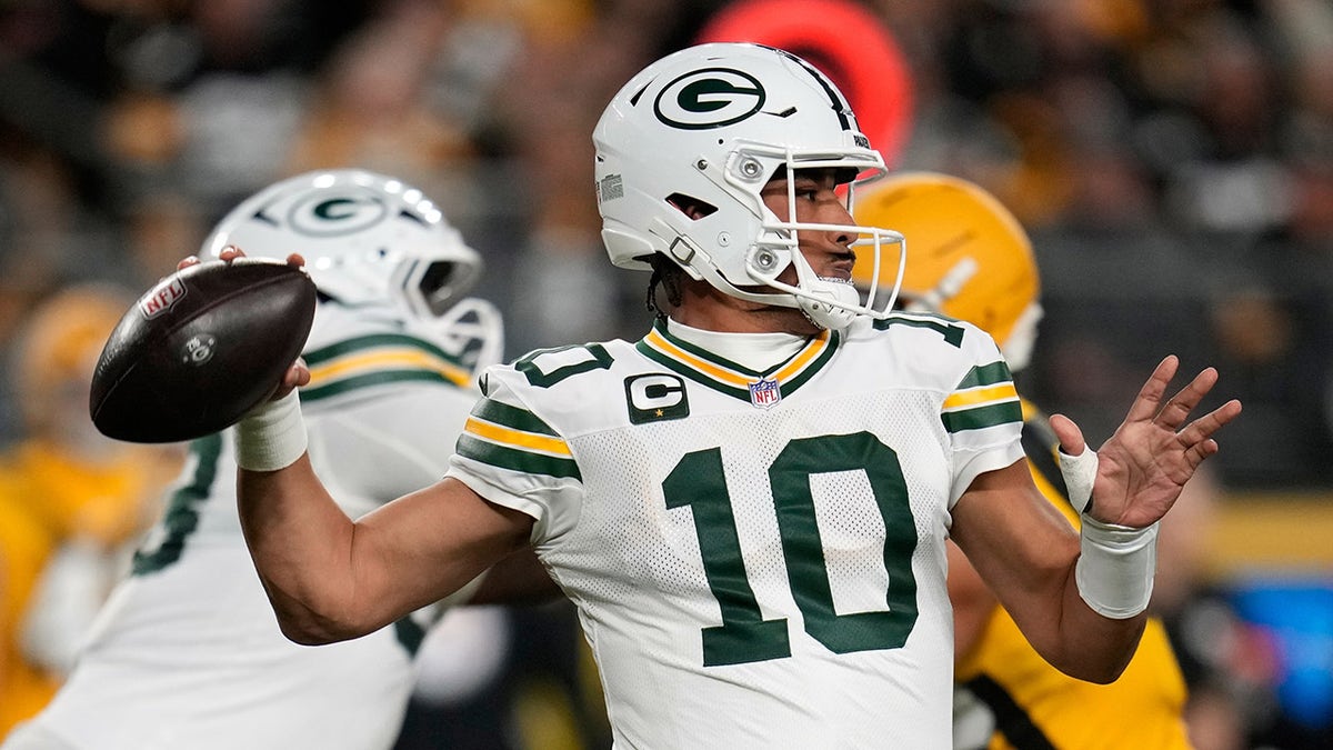 Jordan Love looks to throw