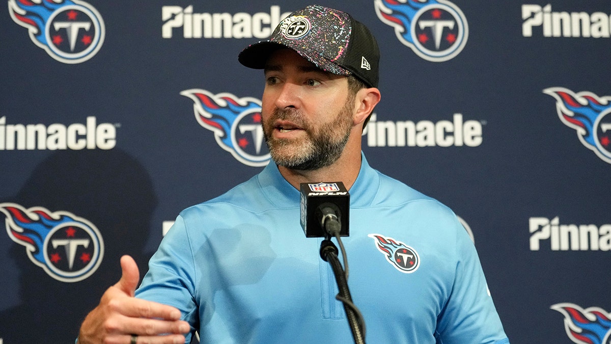 Brian Callahan at a news conference