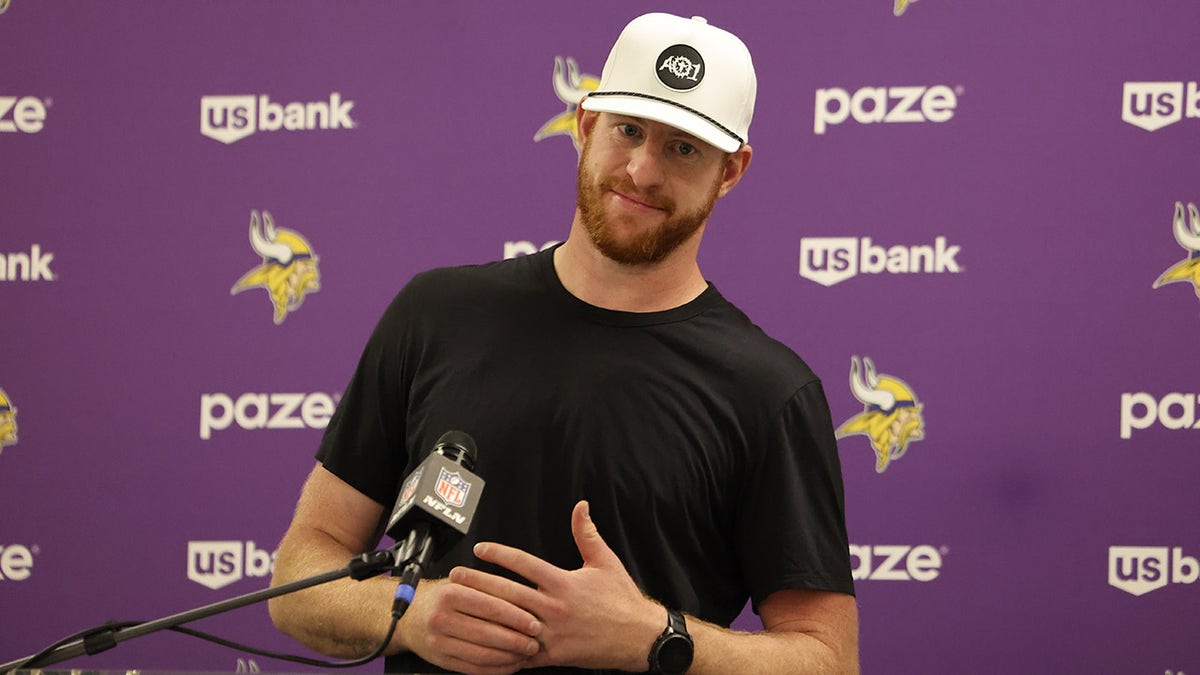 Carson Wentz talks to reporters