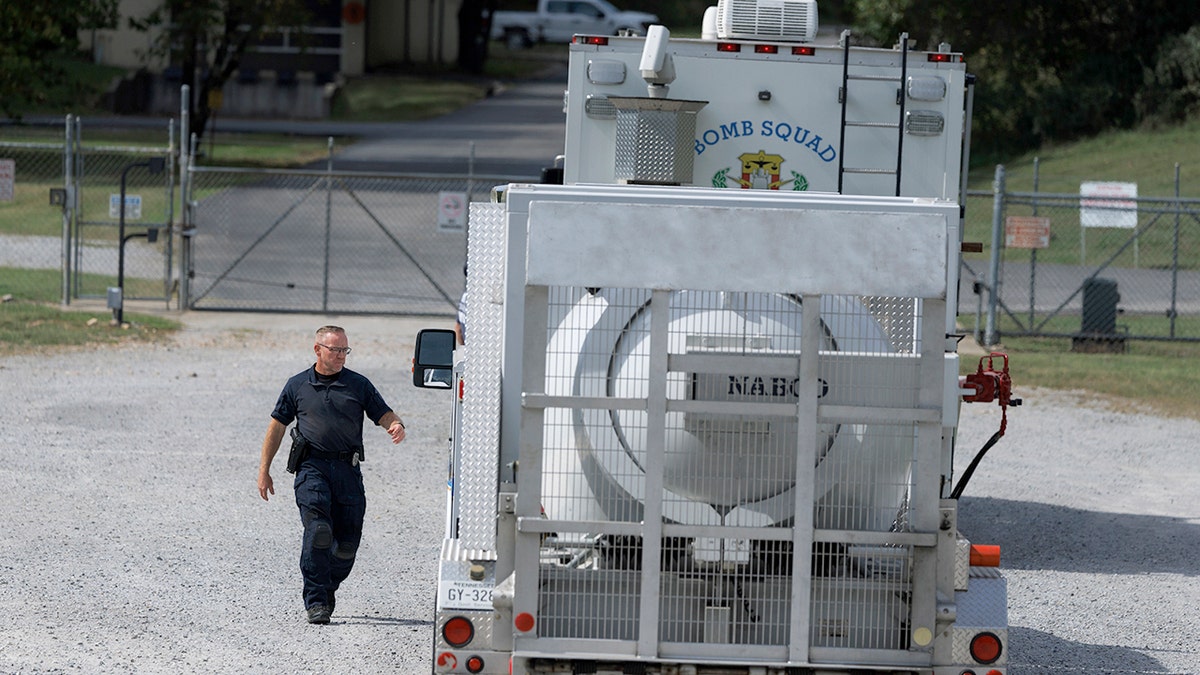 Metropolitan Nashville Police Department bomb squad vehicles arrive to investigate manufacturing plant explosion