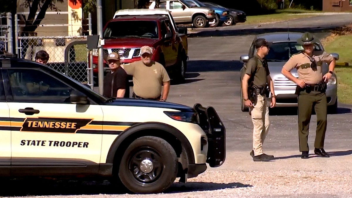 Police guard a gate near guard a gate near Accurate Energetic Systems plant in Tennessee