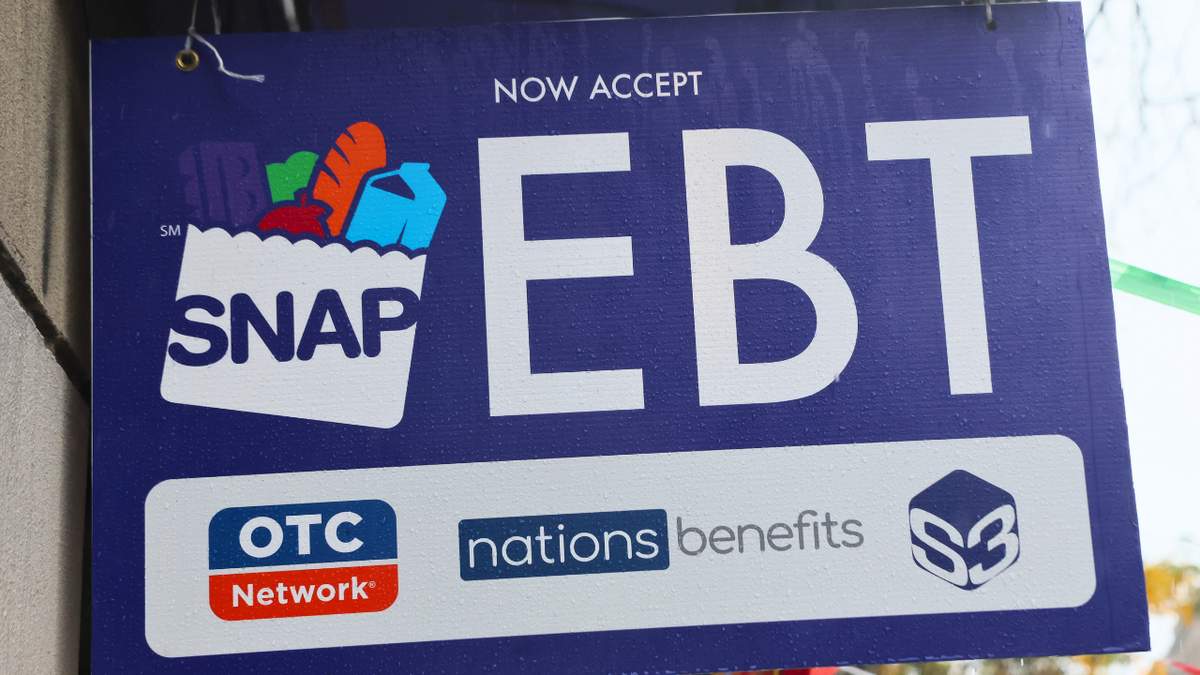 close up photo of ebt/food stamp signin front of a store