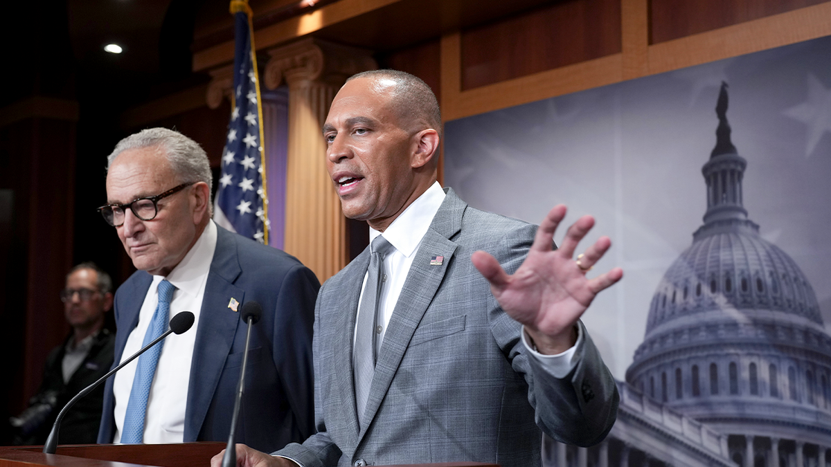 hakeem jeffries and chuck schumer at a news conference
