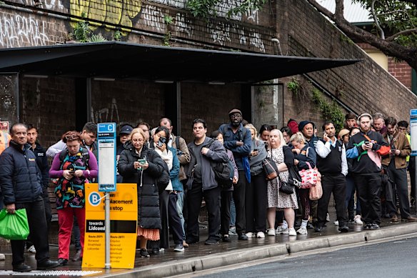 Sydney rail commuters wait for replacement buses.