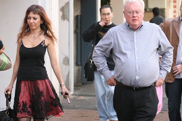 Graham Richardson and his lunch companion are photographed departing the Golden Century restaurant in August 2009.