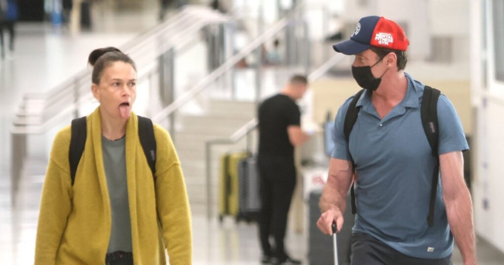 Hugh Jackman and Sutton Foster Have Flirty Airport Outing After Making Their Red Carpet Debut Hugh Jackman and Sutton Foster Have Flirty Airport Outing After Making Their Red Carpet Debut