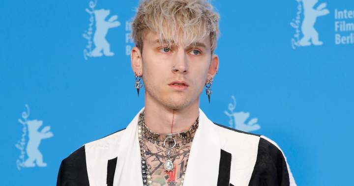 MGK lights up Winnipeg stadium with halftime show at 112th Grey Cup MGK lights up Winnipeg stadium with halftime show at 112th Grey Cup