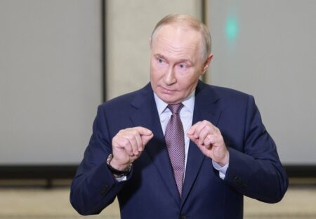 Putin’s hand in viral video sparks health speculation