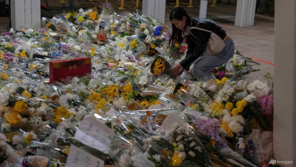 Mourners flock to site of deadly Hong Kong blaze as Beijing warns against protests Mourners flock to site of deadly Hong Kong blaze as Beijing warns against protests