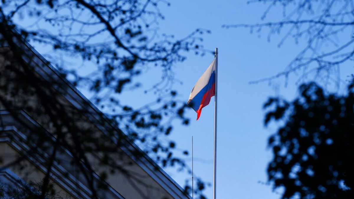 The Russian flag flies over the Russian embassy