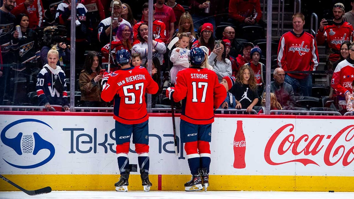 Dylan Strome greets family
