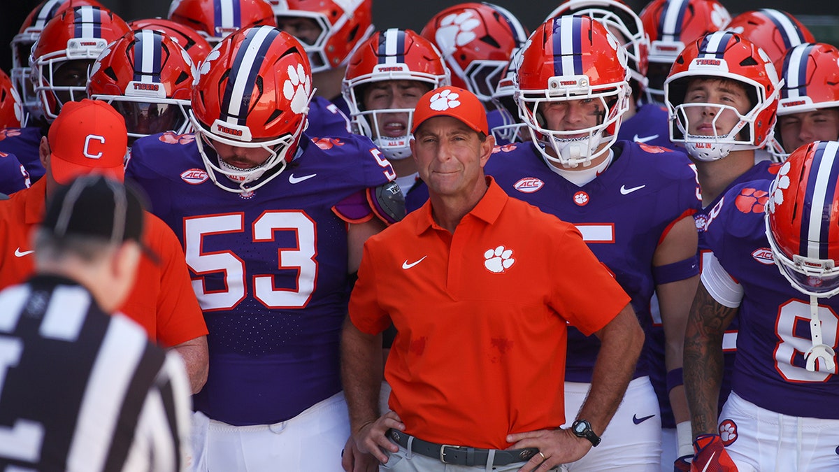 Dabo Swinney leads Clemson out