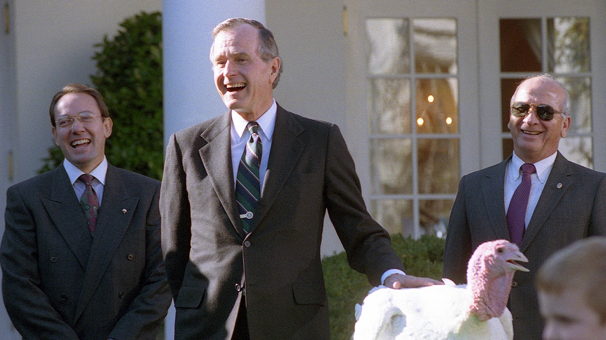 President George H.W. Bush participates in the presentation and pardoning of the National Thanksgiving Turkey in the Rose Garden of the White House. 