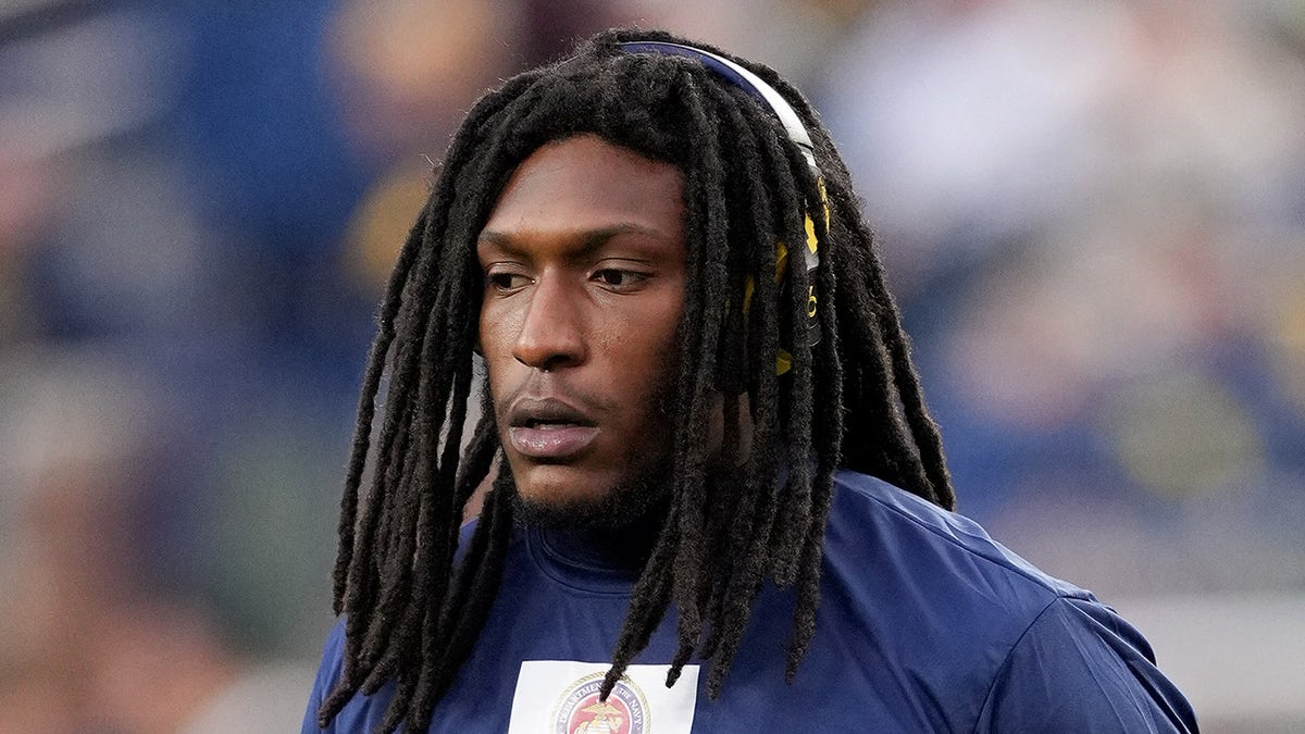 Jaishawn Barham looks on