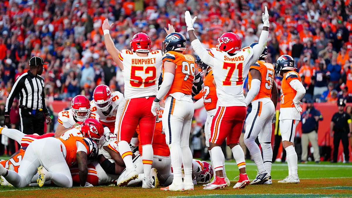 Josh Simmons celebrates touchdown